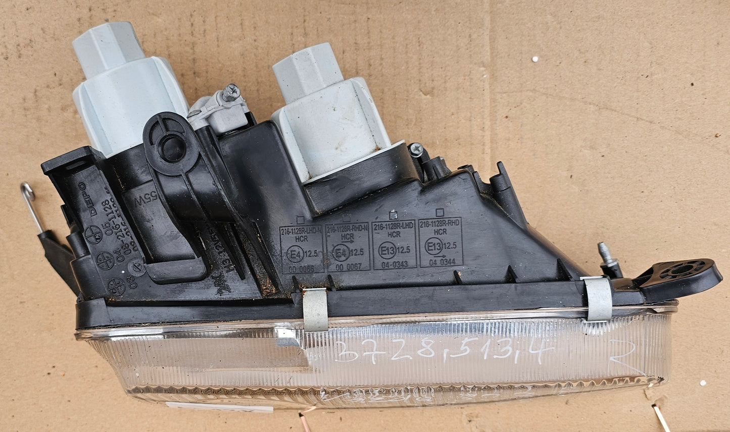 Žaromet sprednji desni-Mazda 323F (novo)