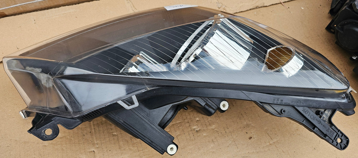 Žaromet sprednji levi-Opel Astra H (novo)