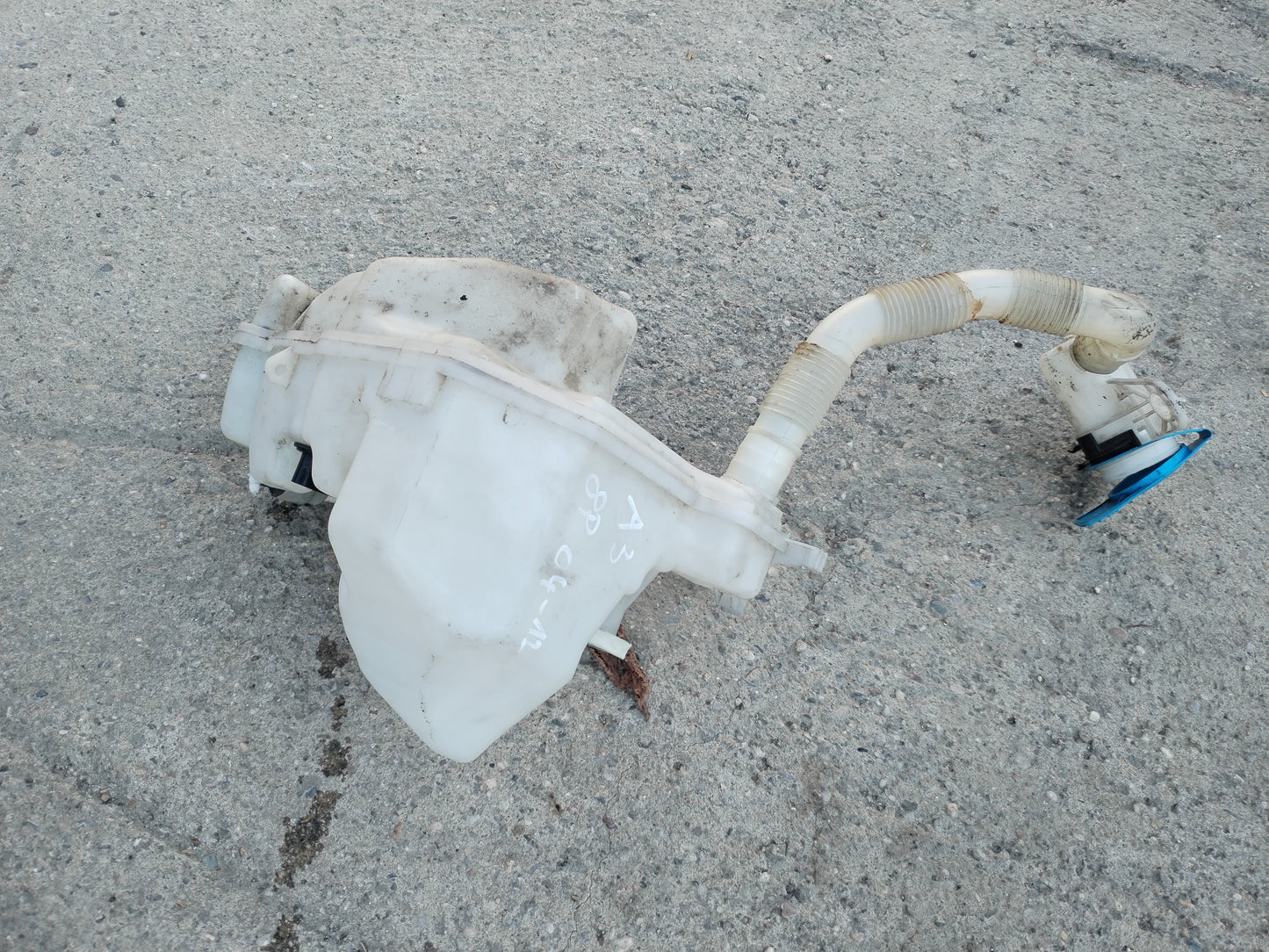 Windshield washer fluid container - Audi A3 8P