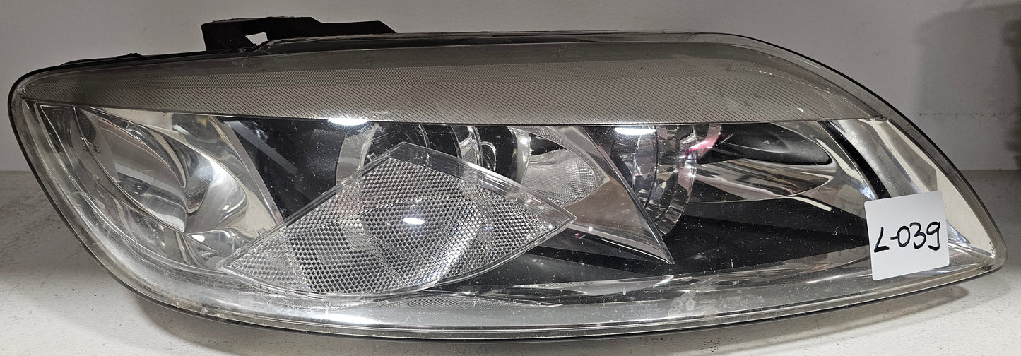 Žaromet sprednji desni-Audi Q7 Xenon