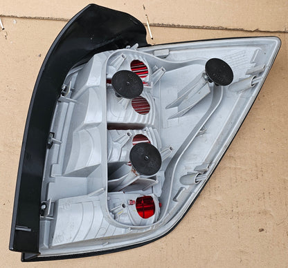 Žaromet zadnji levi-Opel Astra H (novo)