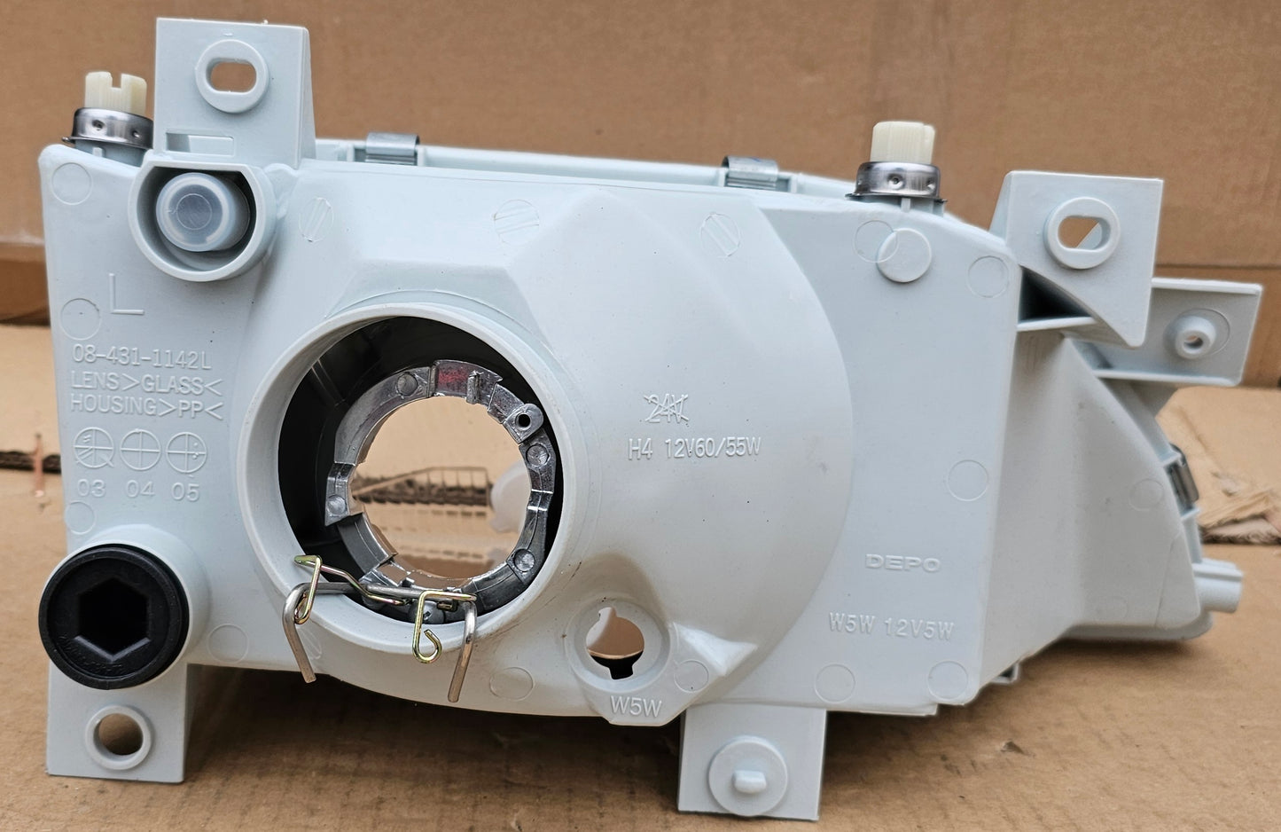 Žaromet sprednji levi-Ford Escort (novo)