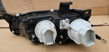 Žaromet sprednji desni-Mazda 323F (novo)