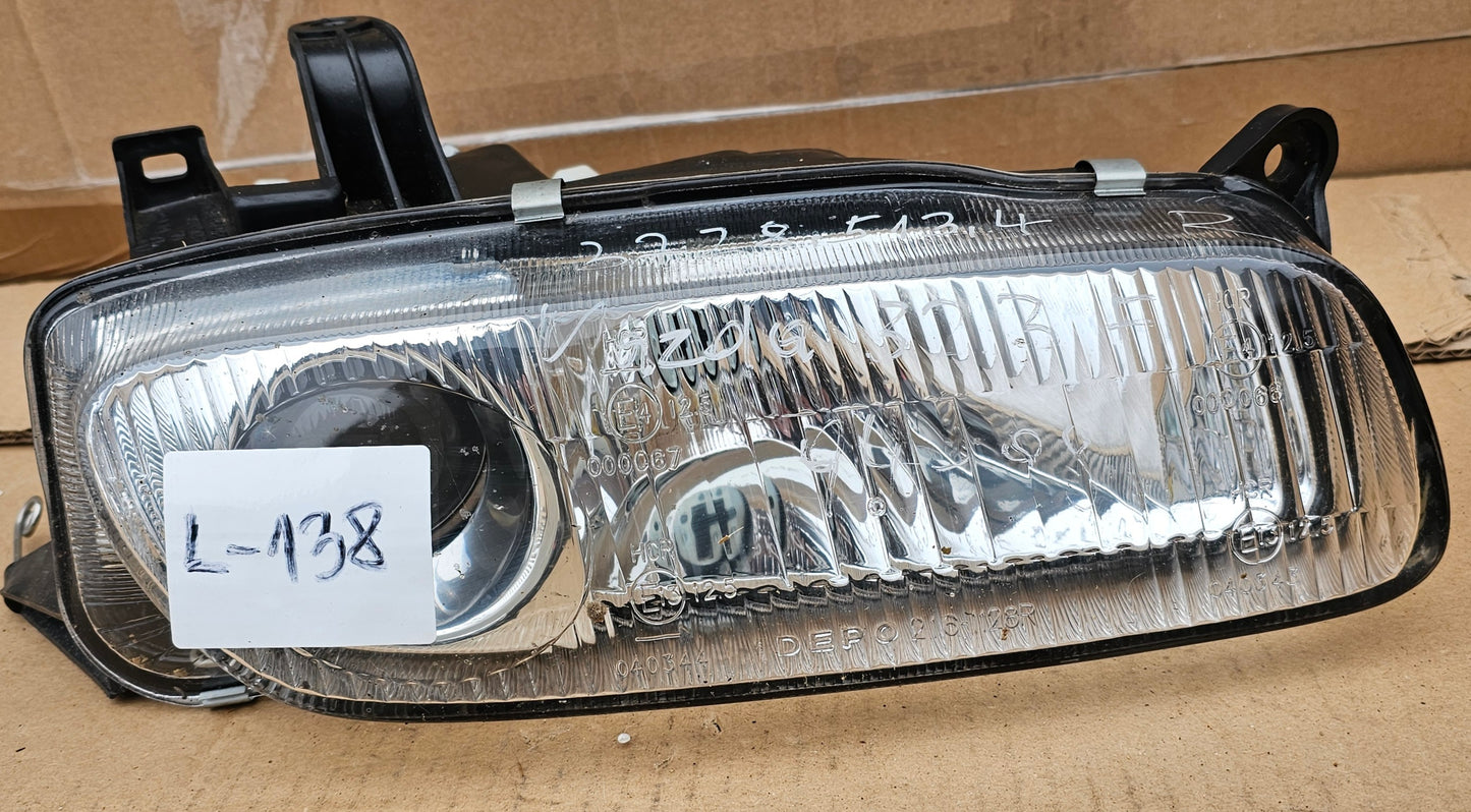 Žaromet sprednji desni-Mazda 323F (novo)