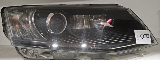 Žaromet sprednji desni-Škoda Octavia III